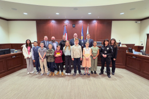 2-28-24-City-Council-with-DARE-essay-contest-winners.jpg