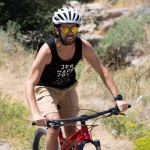 A man on a mountain bike rides on a trail in the Juniper Canyon Recreation Area