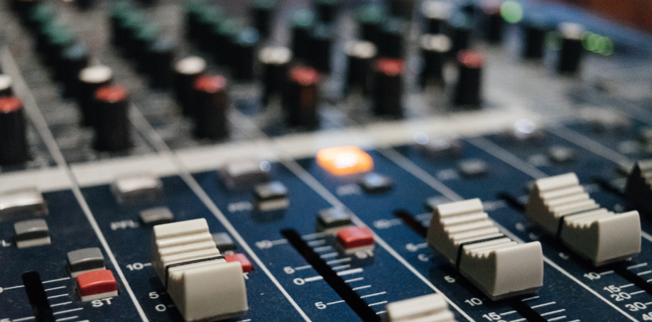 Close-up image of an audio mixer
